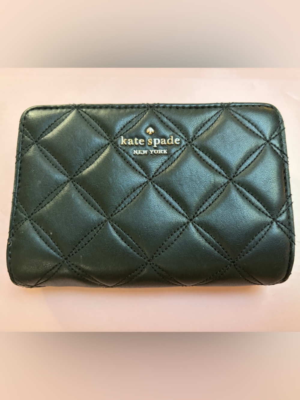 Kate Spade Medium Compact Bifold Wallet in black quilted leather